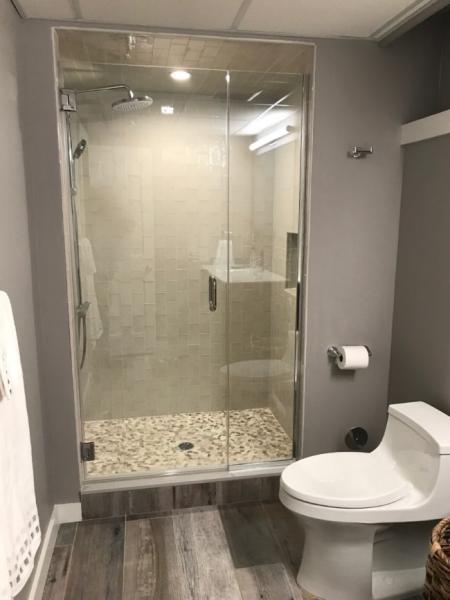 215405470-crop-basement-bathroom-remodel-650x867